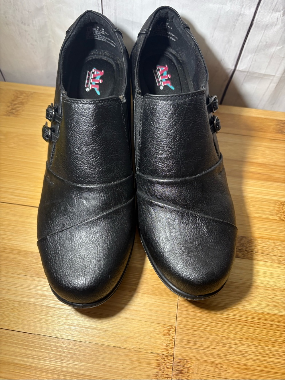 Air Flex Black Slip-On Ankle Booties with Dual Buckle Accent